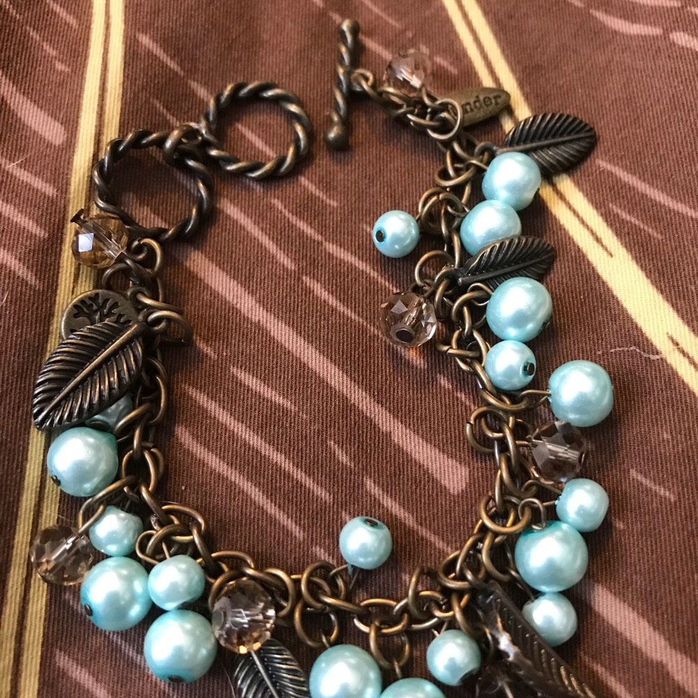 Feather/pearl bracelet.